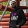 Man wearing black I (heart) tall women sweatshirt